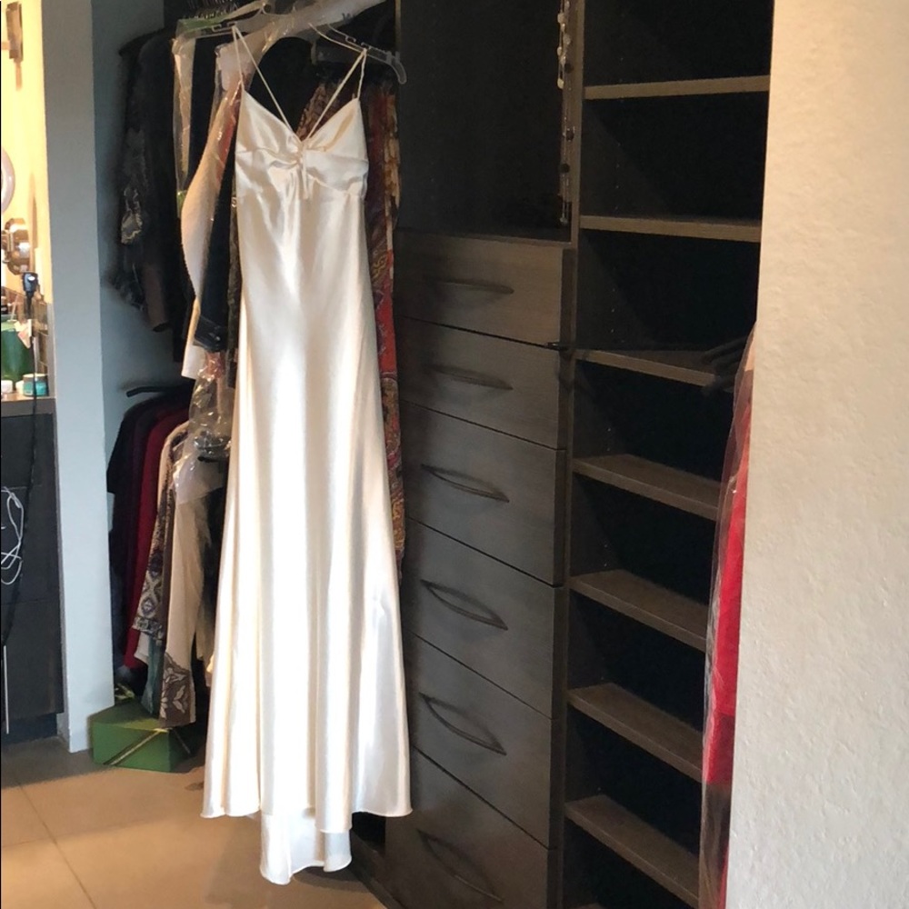 Booty-enhancing, creamy satin gown